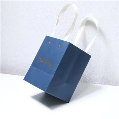 再利用可能なリサイクル可能なカスタマイズ可能なロゴギフトギフトクラフトペーパーバッグ化粧品用香水服のかつらビジネスギフトバッグ用